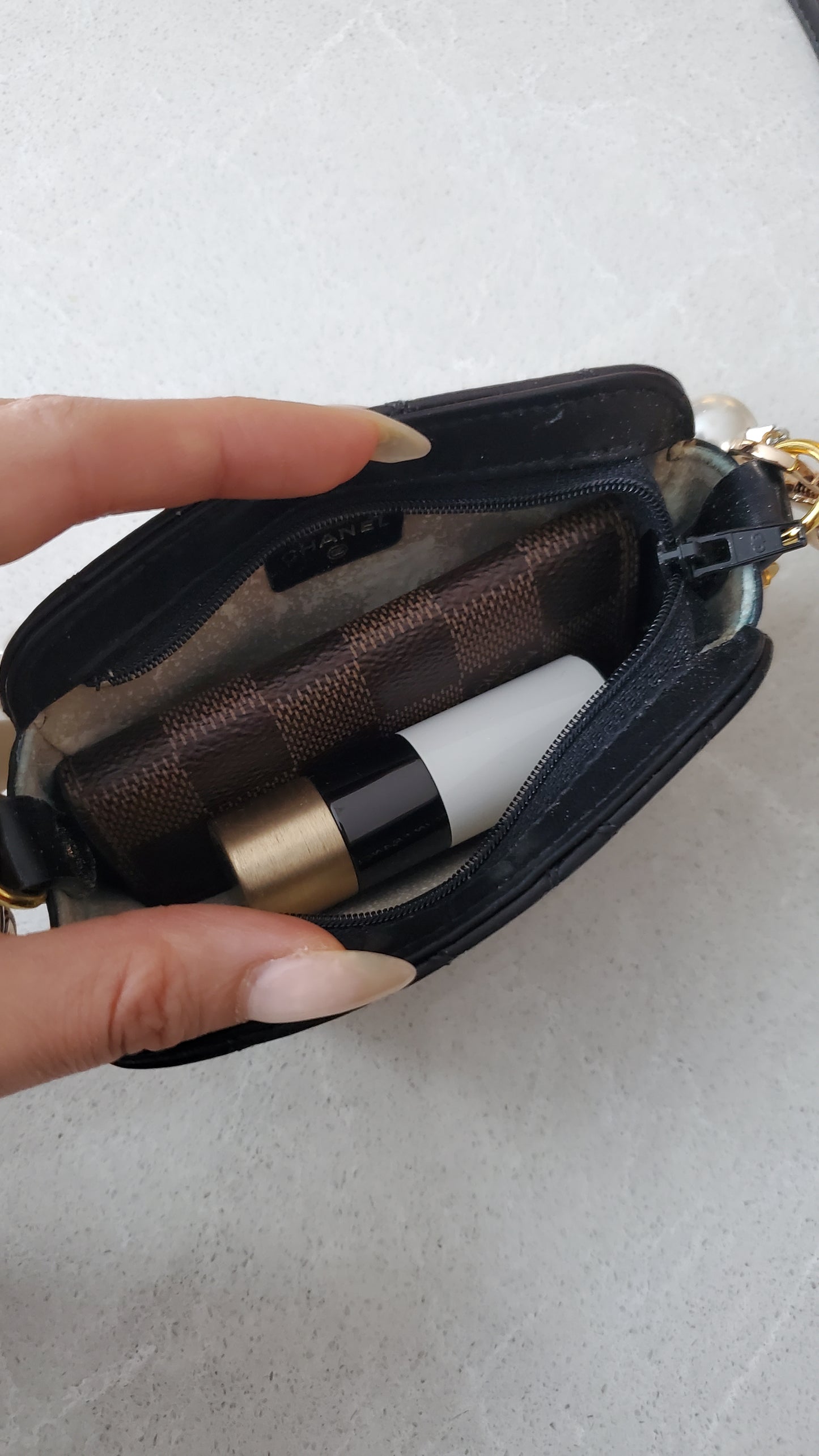 Authentic Chanel Upcycle Black Lambskin Small Pouch with Strap & Chain